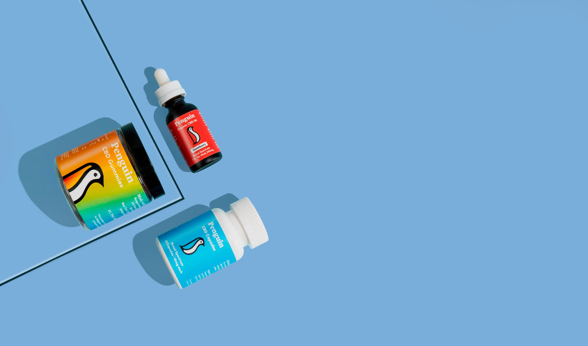 Penguin Wellness CBD oil bottle and hemp extract products for daily stress relief and anxiety support made with broad spectrum Oregon-grown hemp independently lab tested and THC free