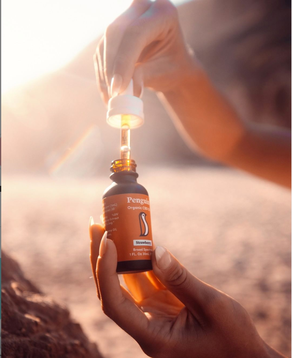 Penguin Wellness CBD oil bottle and broad spectrum hemp extract products for daily wellness support made with Oregon-grown hemp independently lab tested and THC free