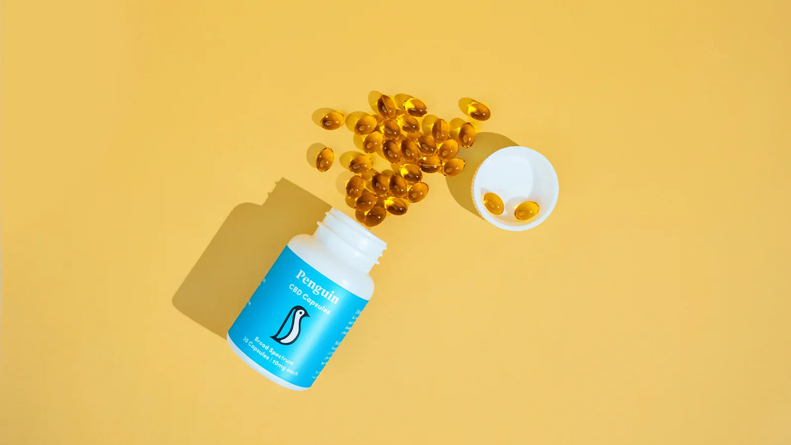 CBD capsules representing broad spectrum THC-free hemp extract for daily wellness without drug test concerns