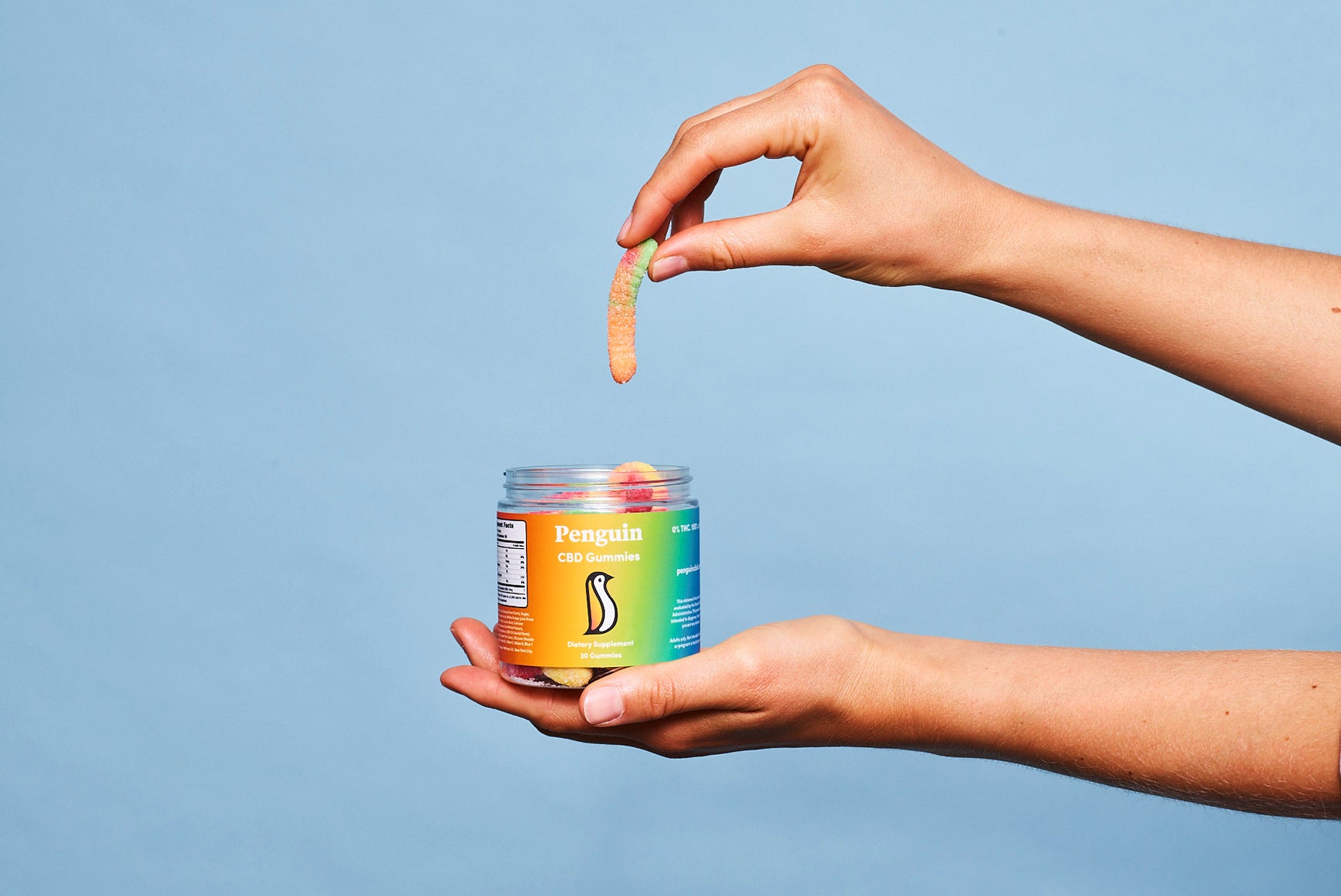 Penguin CBD container of Prenium gummy treats for relaxation